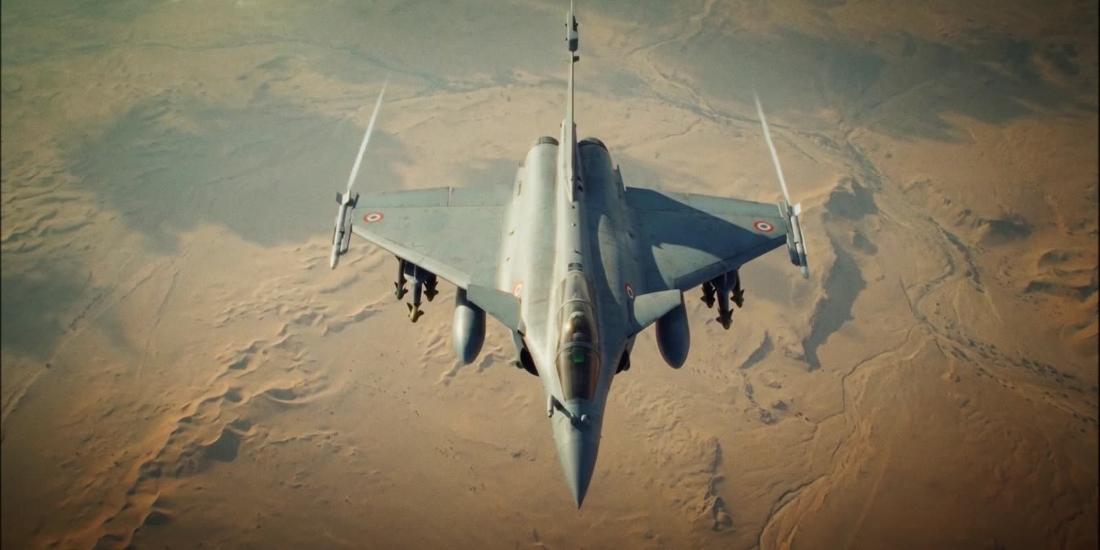 A fighter jet over the desert